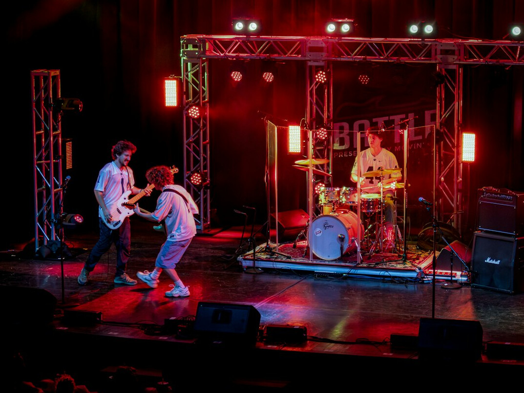 Young musicians rehearsing in a community hall in Denmark